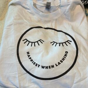 White Graphic Tee with Smiley Face Design